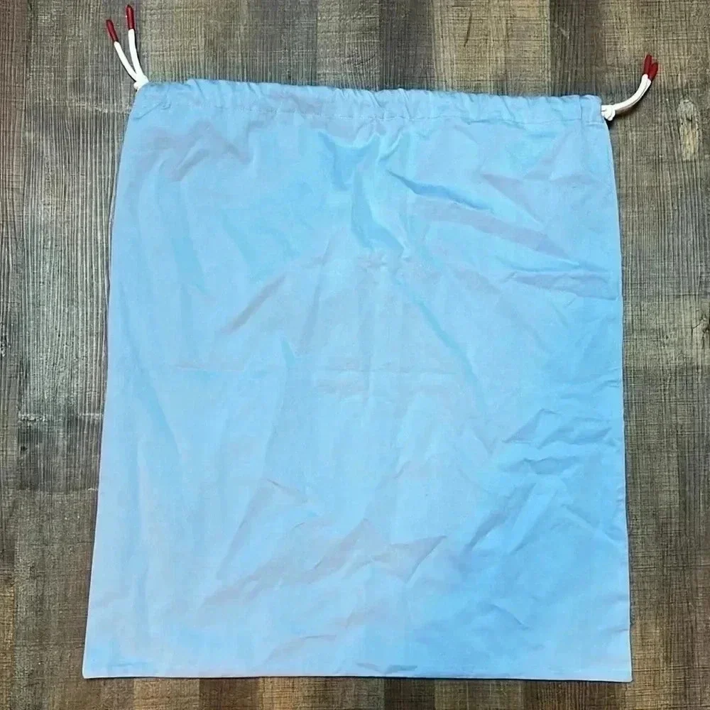 Baindoux dust bag. 20 inches wide x‎ 23 inches high. 2 draw strings.